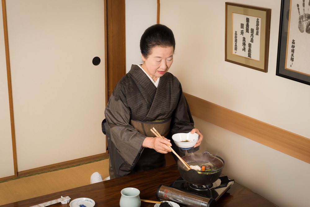 女将
